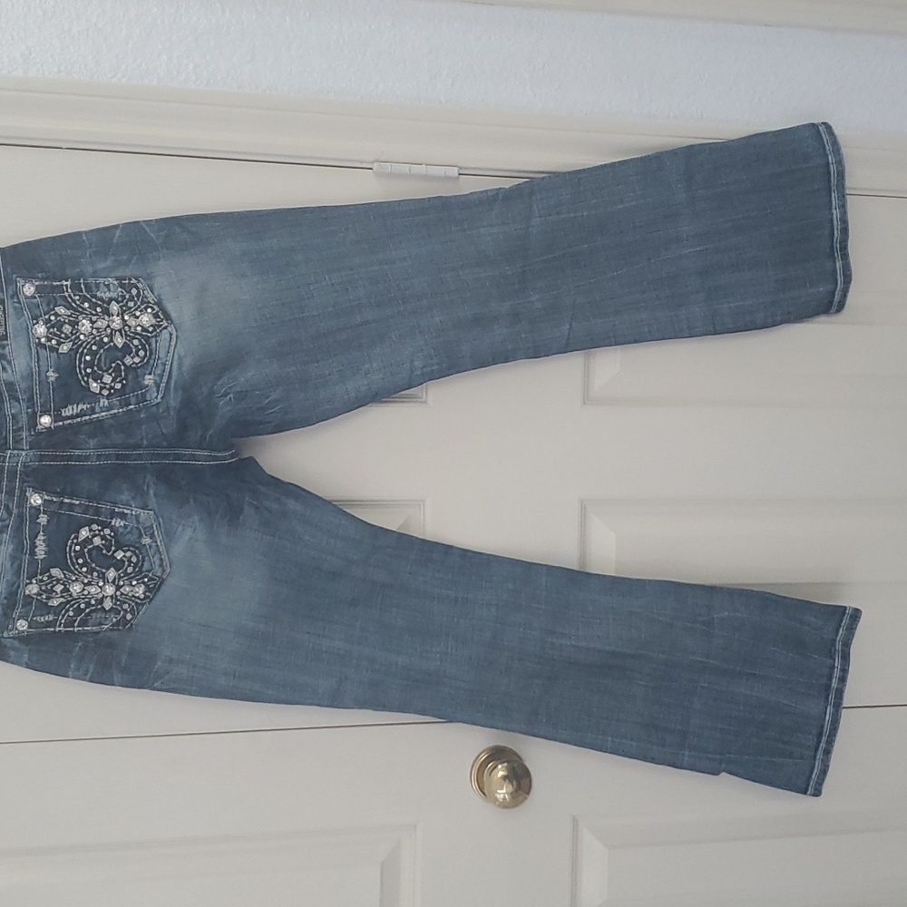Miss Me Woman’s Blue Mid-rise easy boot cut jeans  size 27